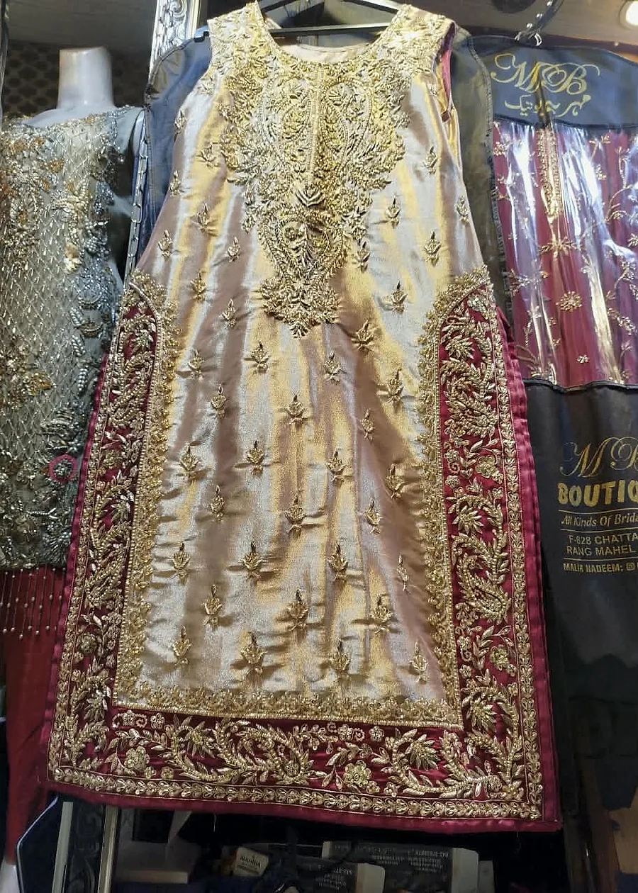 Off-white tissue silk dress with maroon border and golden handmade embroidery