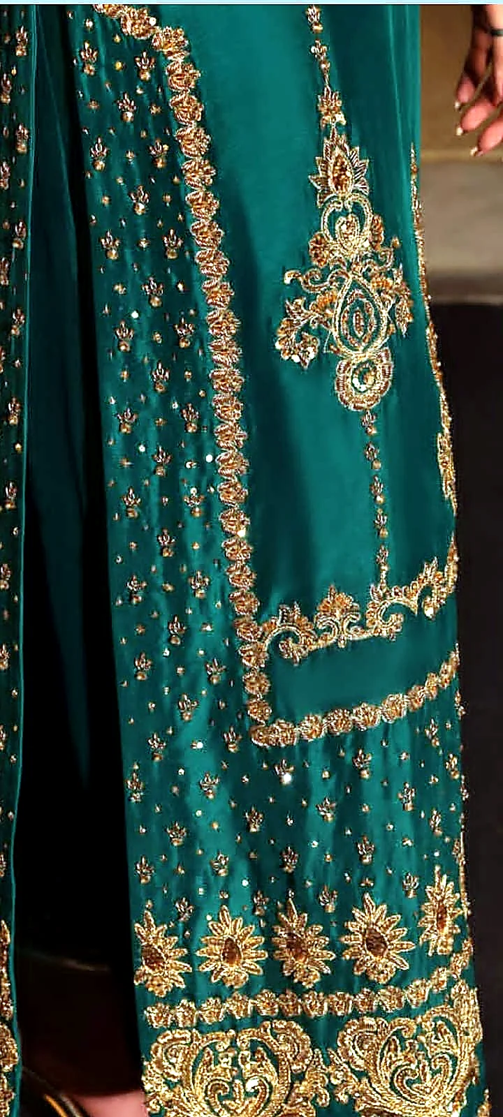 Emerald green formal dress border and spray embroidery detail