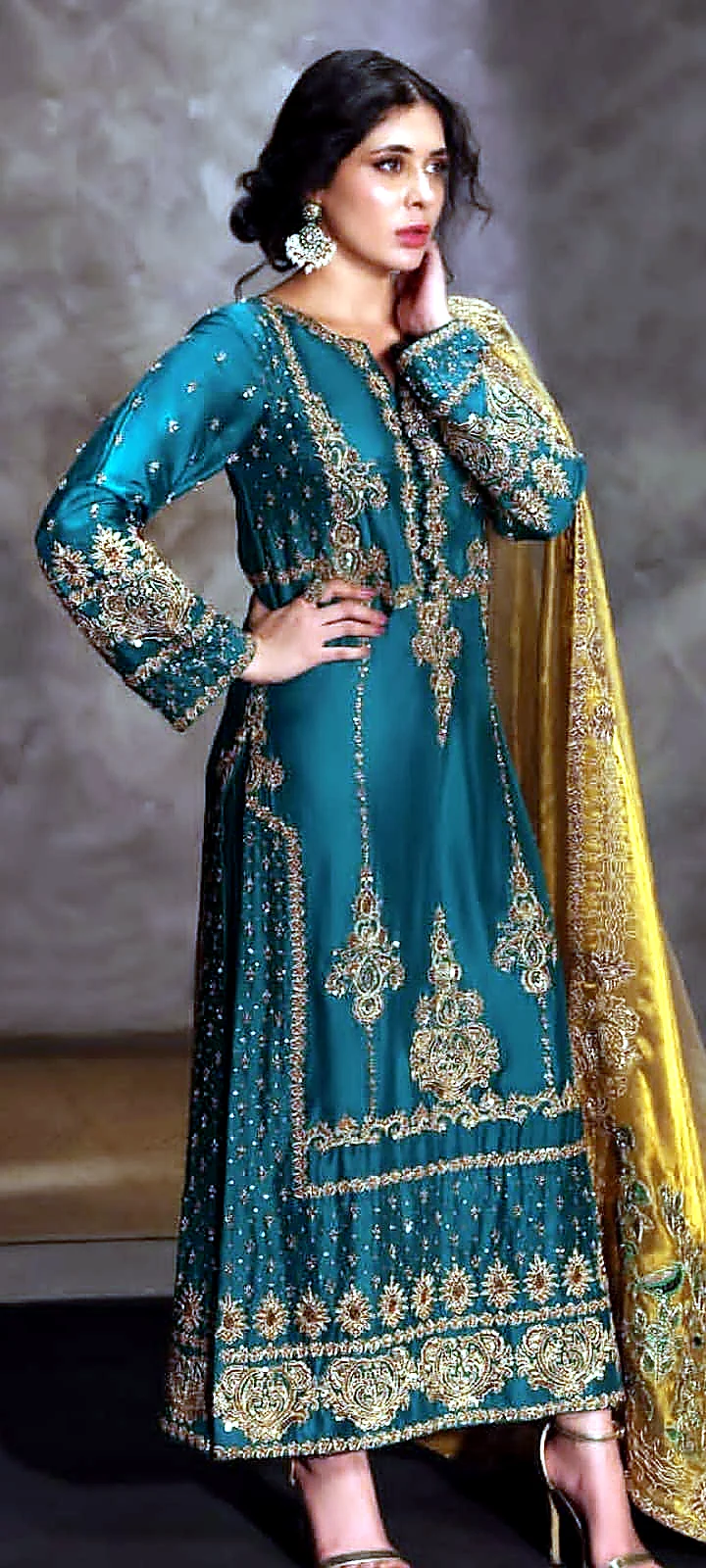 Emerald green formal dress front view with gold dupatta